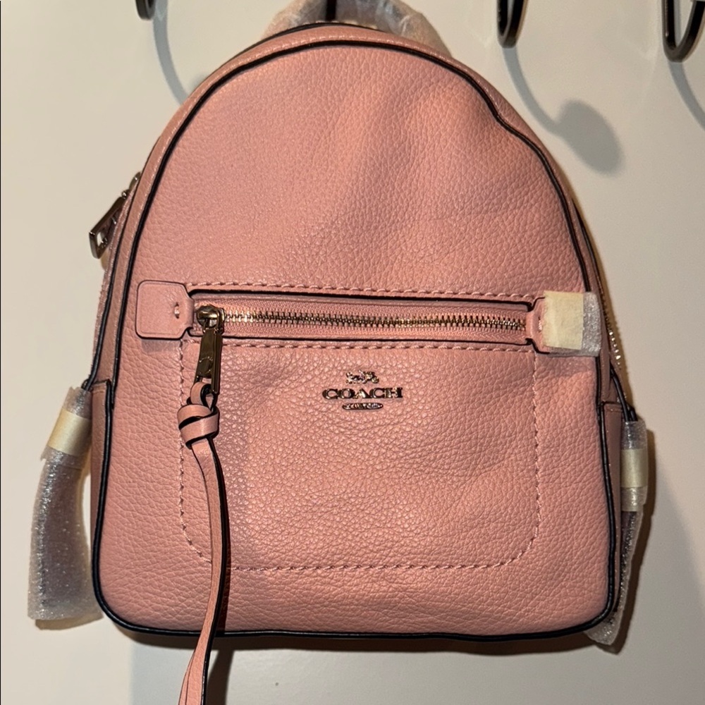 Coach pink pebbled leather “Andi” backpack NWT.